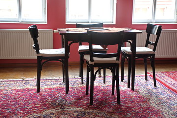 Table and chairs in vintage living room