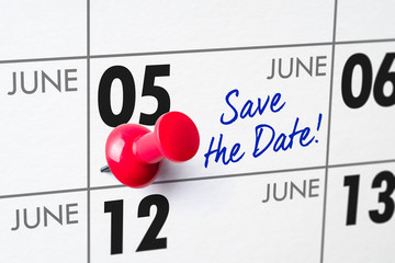Wall calendar with a red pin - June 05
