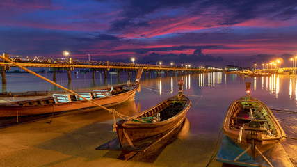 Fototapeta na wymiar Chalong pier during sunrise or sunset,beautiful colorful dramatic sky in Phuket thailand
