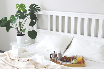 Morning Breakfast in bed. Coffee, croissants, fresh orange juice.