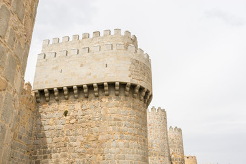 Fototapeta na wymiar Walls of the city of Avila in Castilla y León, Spain. Fortified medieval city