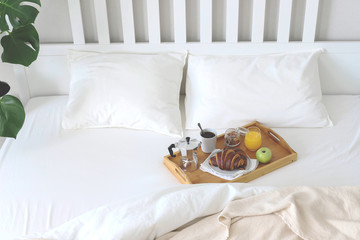Morning Breakfast in bed. Coffee, croissants, fresh orange juice.