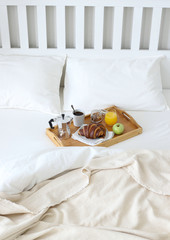 Morning Breakfast in bed. Coffee, croissants, fresh orange juice.