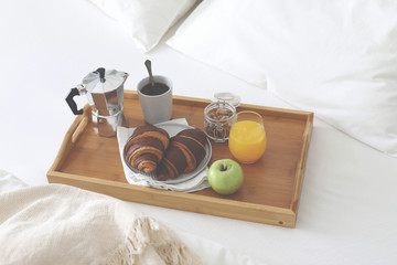 Morning Breakfast in bed. Coffee, croissants, fresh orange juice.