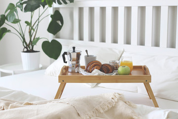 Morning Breakfast in bed. Coffee, croissants, fresh orange juice.