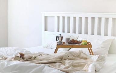 Morning Breakfast in bed. Coffee, croissants, fresh orange juice.