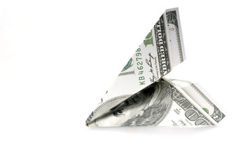 Airplane from one hundred dollar money on white background