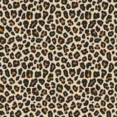 Leopard print. Vector seamless pattern. Animal skin background with black and brown spots on beige backdrop. Abstract exotic jungle texture. Repeat design for decor, fabric, textile, wallpapers, cloth
