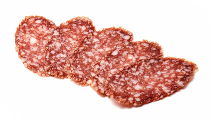 Appetizing sausage pieces on white isolated background. Close-up.