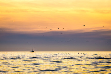 Lobster fishing boat scenery of Canada's Atlantic coast with a beautiful sky.