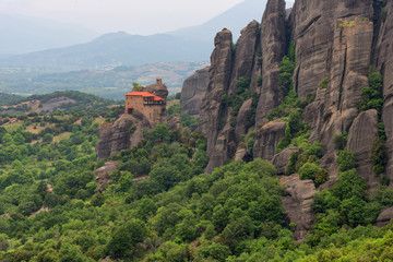 Fototapeta na wymiar Magnificent spring landscape.The Monastery of St. Nicholas at Meteora. Meteora is one of the largest built complexes of Eastern Orthodox monasteries in Greece.