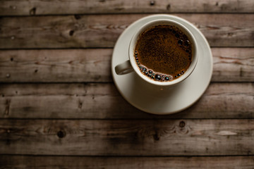 White coffee Cup on wood natural background