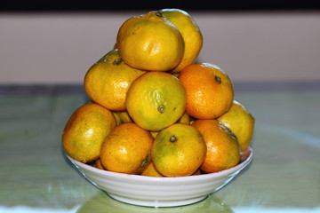 A plate of tangerines from Jeju island. Korea.
