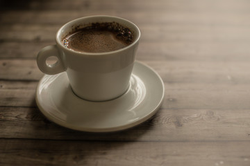 White coffee Cup on wood natural background