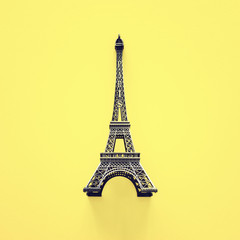 Fototapeta na wymiar Paris symbol Eiffel Tower over yellow background