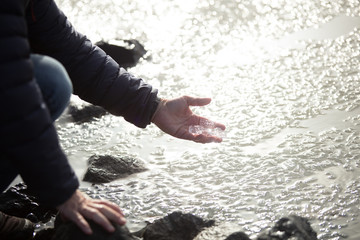 holding pieces of iceberg