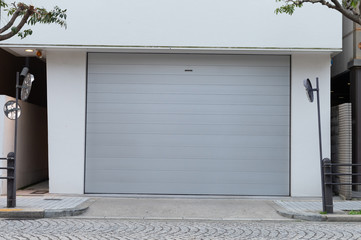 A closeup shot of automatic metal roller door used in factory, storage, garage, and industrial...
