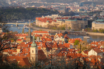 Naklejka na ściany i meble Beautiful sunset light over Prague old town from Petrin hill