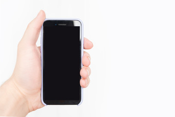Male hand with a smartphone. Black blank screen. White background. Isolate