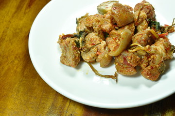 spicy stir fried slice pork leg with eggplant curry on plate