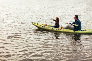 Fototapeta na wymiar Father and son fishing in the lake