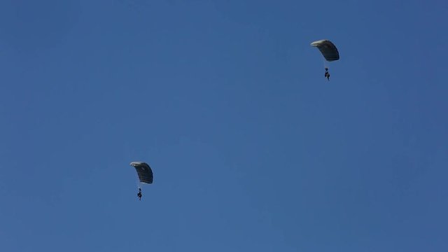 Soldiers gliding in formation in the sky 2