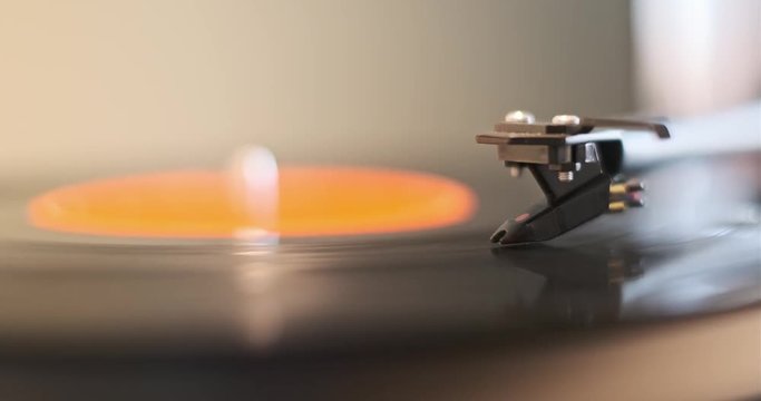Vintage Retro vinyl LP record turntable player head with an record playing isolated 