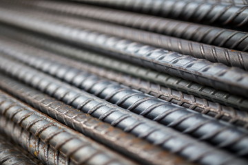Stack of steel bar texture in construction site for background.
