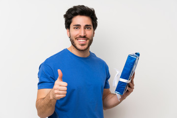 Handsome man holding gift box