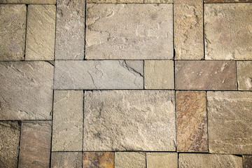 Road pavement natural stone with uneven textured shape on the surface