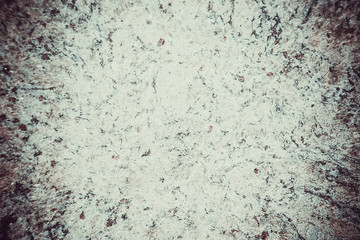 Marble natural tile with a rough textured surface of purple color