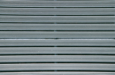 Metal grill with a rubber textured coating grey color