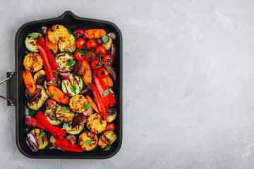 Grilled vegetables in a cast iron pan. Top view.
