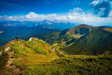 Hiker in beautiful mountain landscape, sense of freedom concept