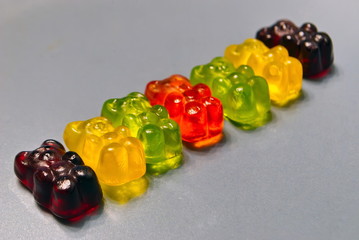 Multicolored jelly bears. Delicious jelly bears. Macro photo.