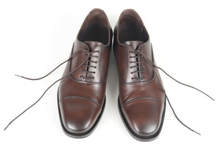 Classic men's brown shoes on white background. Leather shoes
