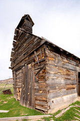 Rustic old schoolhouse falling down from time and age