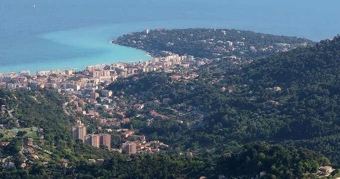 Beautiful Aerial View Of The City Of Roquebrune-Cap-Martin And Cap Martin, Buildings, Houses, Trees And Hills On The Mediterranean Sea, French Riviera, France Europe - DCi 4K Resolution