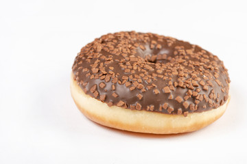 Closeup Of Donut With Chocolate Topping Cream
