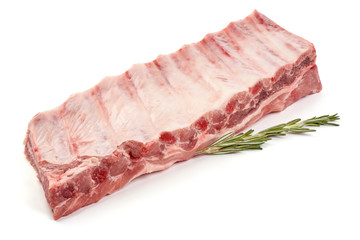 Pork Ribs with rosemary, raw meat, close-up, isolated on white background