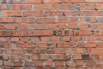 Background with the old shabby brick wall