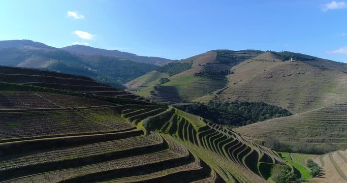 Aerial view of the terraced vineyards in the Douro Valley near the village of Pinhao, Portugal; Concept for travel in Portugal and most beautiful places in Portugal