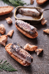 Close up of canned sardines on toast