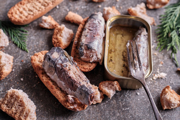 Close up of canned sardines on toast