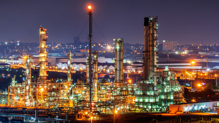 Fototapeta na wymiar Oil refinery and​ industrial​ city​ After sunset