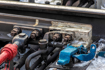 Old automatic railway shunt repaired with wires.