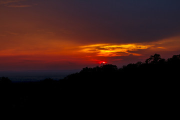 Fototapeta na wymiar Sunset on the back of the mountain