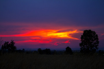 Fototapeta na wymiar Sunset on the back of the mountain