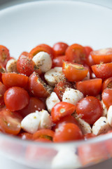  Home cooking. Salad of cherry tomatoes and mozzarella with spices.