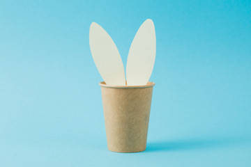 Fototapeta na wymiar Creative rabbit with disposable cup